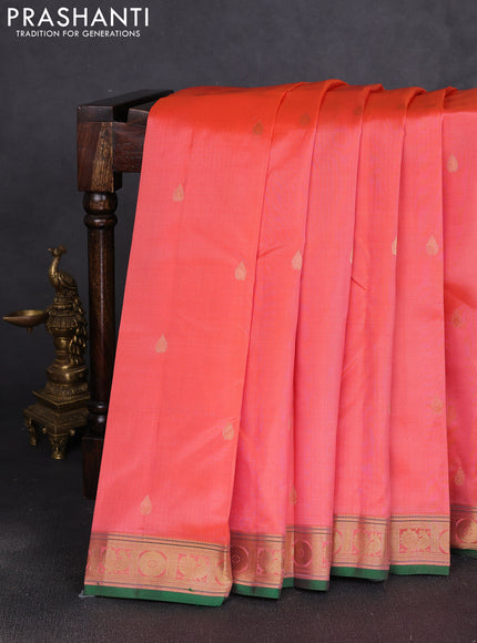 Pure kanchipuram silk saree peach orange and green with zari woven buttas and zari woven border