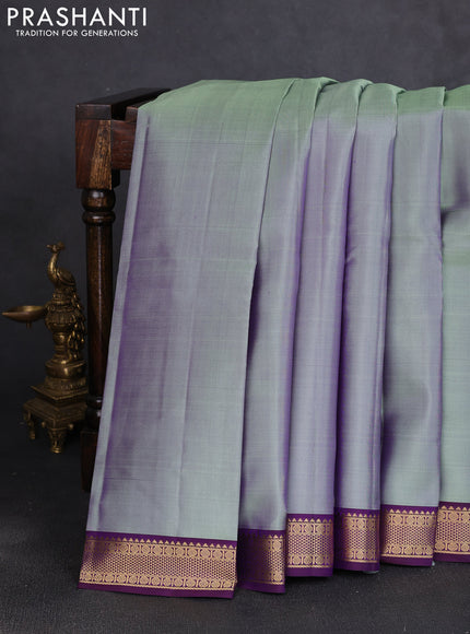 Pure kanchipuram silk saree pastel green and purple with plain body and zari woven korvai border