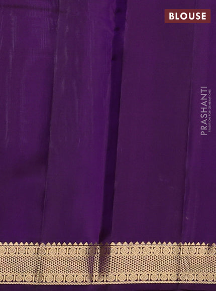 Pure kanchipuram silk saree pastel green and purple with plain body and zari woven korvai border