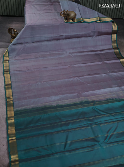 Pure kanchipuram silk saree grey and teal green with plain body and zari woven border