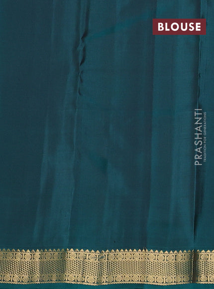 Pure kanchipuram silk saree grey and teal green with plain body and zari woven border