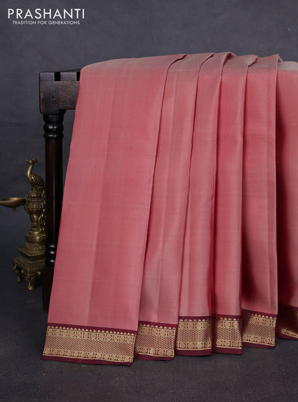 Pure kanchipuram silk saree pastel maroon and deep maroon with plain body and zari woven border
