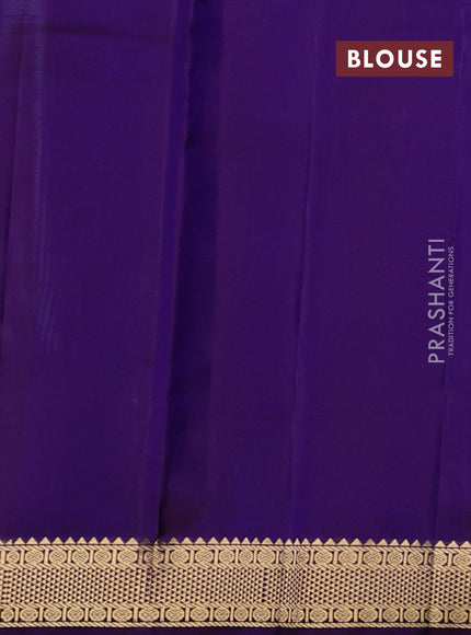 Pure kanchipuram silk saree blue shade and violet with plain body and zari woven border