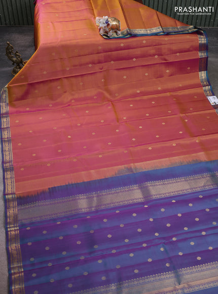 Pure kanchipuram silk saree rust shade and teal green with zari woven buttas and zari woven border