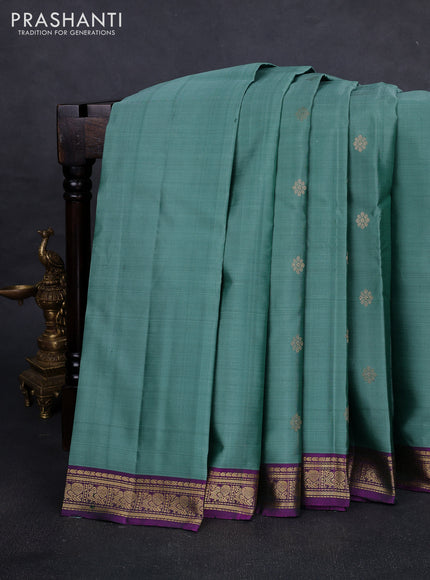Pure kanchipuram silk saree pastel green and purple with zari woven buttas and zari woven border