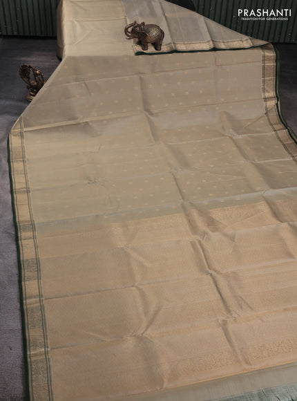 Pure kanchipuram silk saree pastel green and green with allover zari checks & buttas and zari woven border
