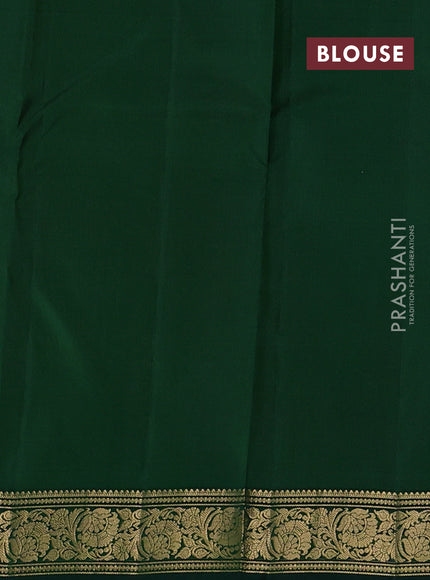 Pure kanchipuram silk saree pastel green and green with allover zari checks & buttas and zari woven border