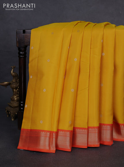 Pure kanchipuram silk saree yellow and orange with zari woven buttas and zari woven korvai border