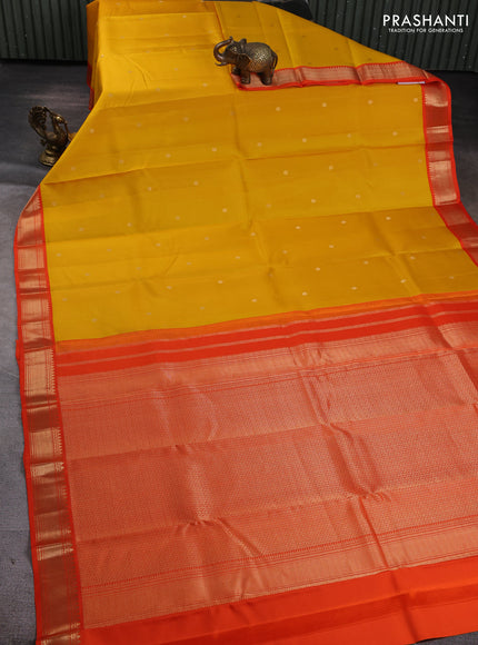 Pure kanchipuram silk saree yellow and orange with zari woven buttas and zari woven korvai border