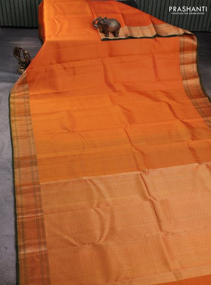 Pure kanchipuram silk saree mango yellow and bottle green with allover small zari checked pattern and zari woven border