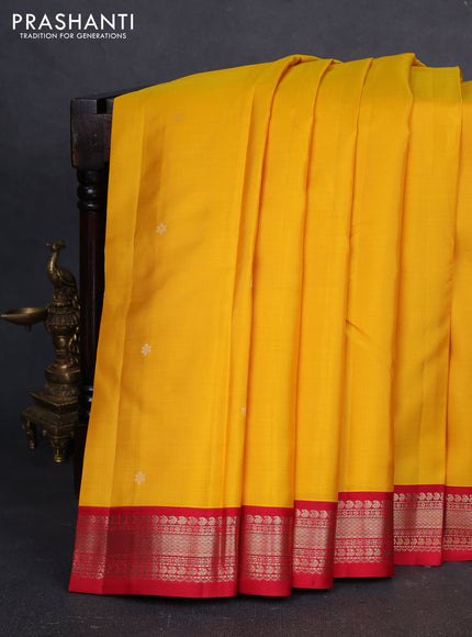Pure kanchipuram silk saree yellow and red with zari woven buttas and zari woven korvai border