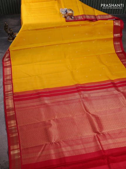 Pure kanchipuram silk saree yellow and red with zari woven buttas and zari woven korvai border