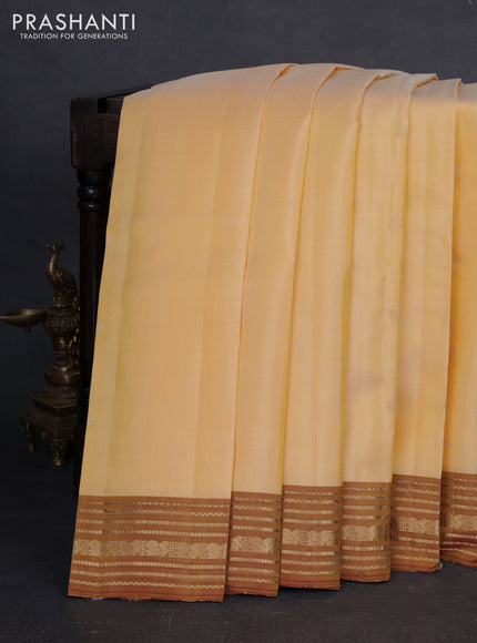 Pure kanchipuram silk saree pale yellow and mustard yellow with zari woven buttas and zari woven border