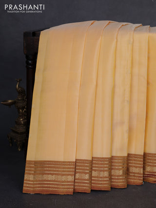 Pure kanchipuram silk saree pale yellow and mustard yellow with zari woven buttas and zari woven border
