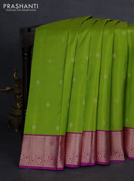 Pure kanchipuram silk saree green and purple with allover zari woven buttas and zari woven korvai border