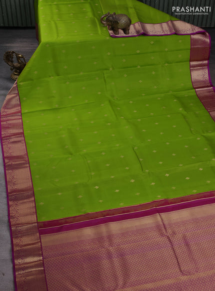 Pure kanchipuram silk saree green and purple with allover zari woven buttas and zari woven korvai border