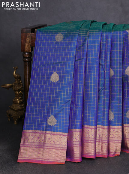 Pure kanchipuram silk saree dual shade of bluish green and purple with allover zari checks & buttas and zari woven border