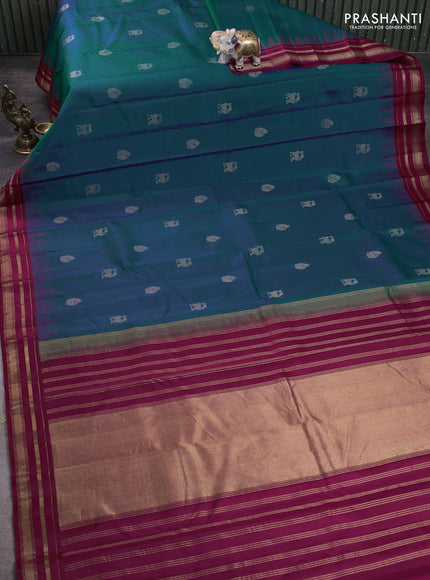 Pure kanchipuram silk saree dual shade of bluish green and wine shade with zari woven buttas and temple design zari woven border