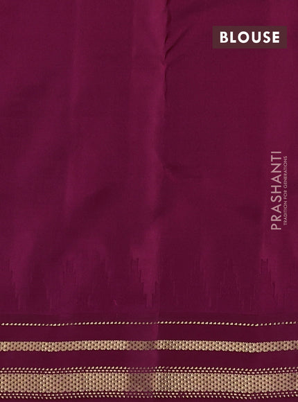 Pure kanchipuram silk saree dual shade of bluish green and wine shade with zari woven buttas and temple design zari woven border