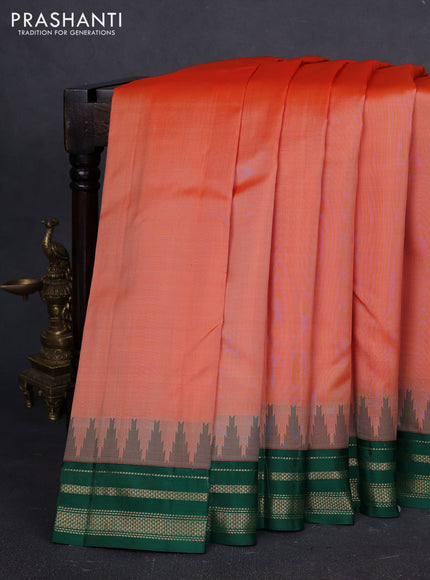 Pure kanchipuram silk saree peach orange and green with plain body and temple design zari woven border