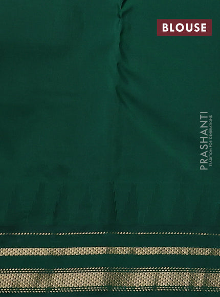 Pure kanchipuram silk saree peach orange and green with plain body and temple design zari woven border