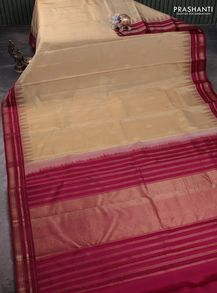 Pure kanchipuram silk saree cream and deep maroon with zari woven buttas and temple design zari woven border