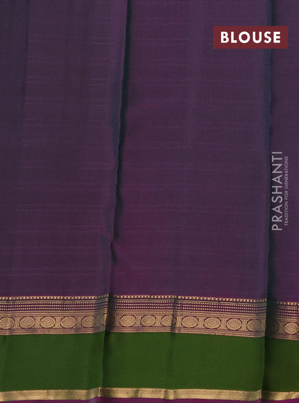 Pure kanchipuram silk saree dual shade og green and purple with allover checks & zari buttas and zari woven simple border