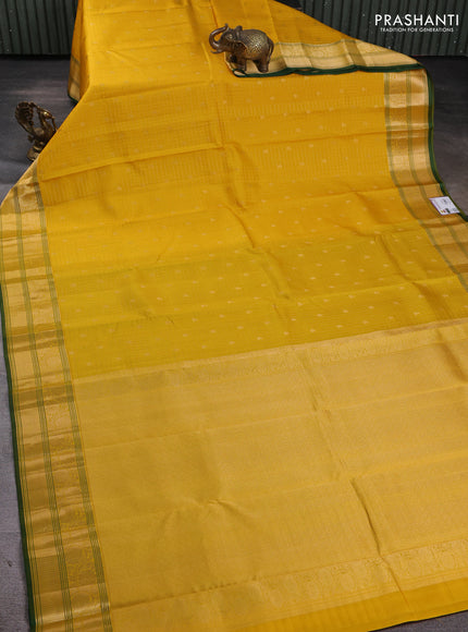 Pure kanchipuram silk saree yellow and green with allover zari checks & buttas and zari woven border