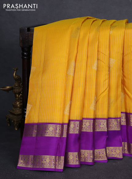 Pure kanchipuram silk saree yellow and purple with allover zari stripe & buttas and rettapet zari woven border