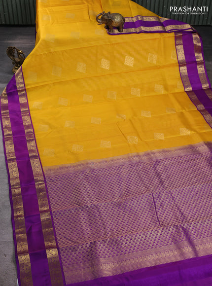 Pure kanchipuram silk saree yellow and purple with allover zari stripe & buttas and rettapet zari woven border