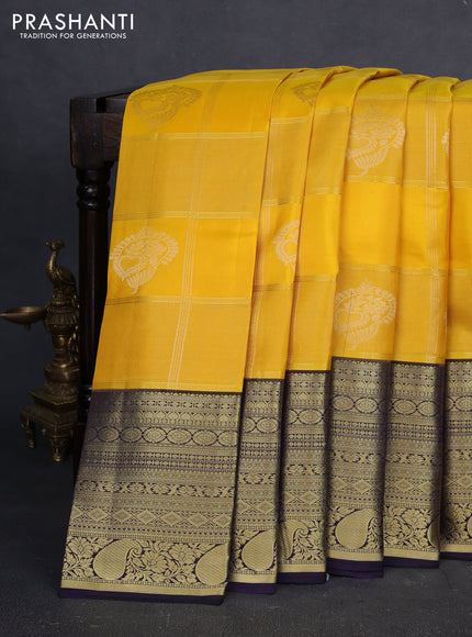 Pure kanchipuram silk saree yellow and black with allover zari checks & buttas and long azri woven border