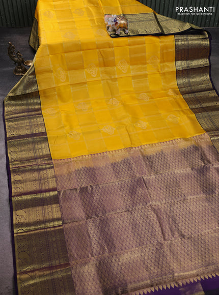 Pure kanchipuram silk saree yellow and black with allover zari checks & buttas and long azri woven border
