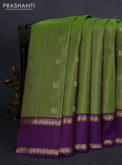 Pure kanchipuram silk saree light green and violet with annam zari woven buttas and rettapet zari woven border