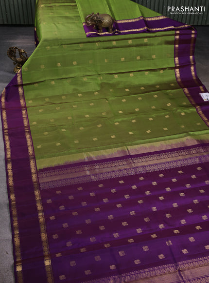 Pure kanchipuram silk saree light green and violet with annam zari woven buttas and rettapet zari woven border