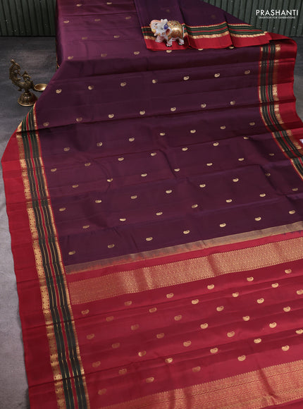 Pure kanchipuram silk saree deep wine and maroon with zari woven buttas and zari woven simple border
