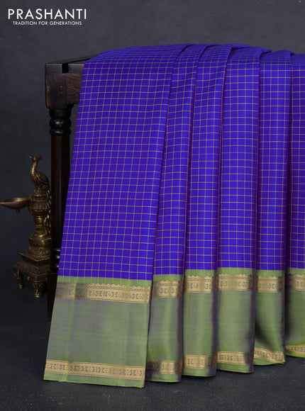 Pure kanchipuram silk saree royal blue and light green with allover thread checked pattern and rettapet zari woven border