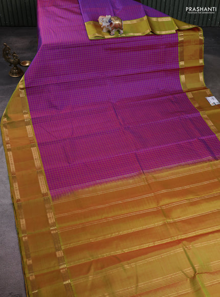 Pure kanchipuram silk saree purple and light green with allover thread checked pattern and rettapet zari woven border