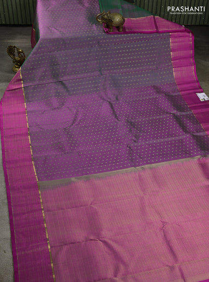 Pure kanchipuram silk saree dual shade of purple and pink with allover zari woven buttas and zari woven border