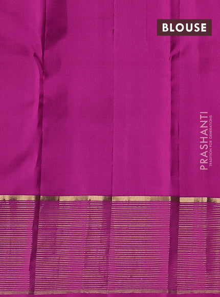 Pure kanchipuram silk saree dual shade of purple and pink with allover zari woven buttas and zari woven border