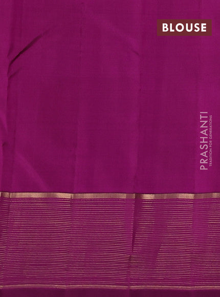 Pure kanchipuram silk saree dual shade of pinkish yellow and purple with allover zari woven buttas and zari woven border