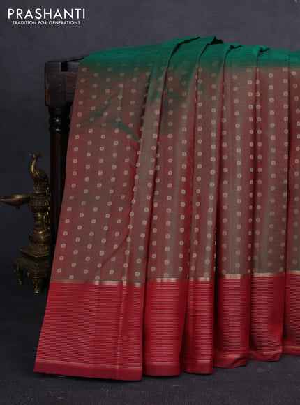 Pure kanchipuram silk saree dual shade of green and maroon with allover zari woven buttas and zari woven border