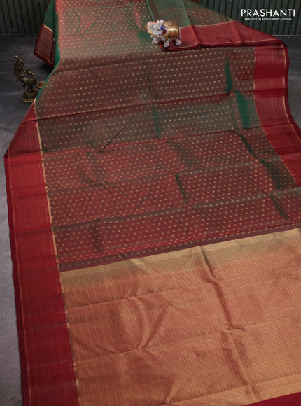 Pure kanchipuram silk saree dual shade of green and maroon with allover zari woven buttas and zari woven border