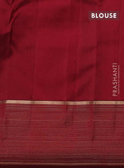 Pure kanchipuram silk saree dual shade of green and maroon with allover zari woven buttas and zari woven border