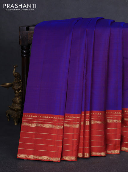 Pure kanchipuram silk saree violet and orange with plain body and zari woven border