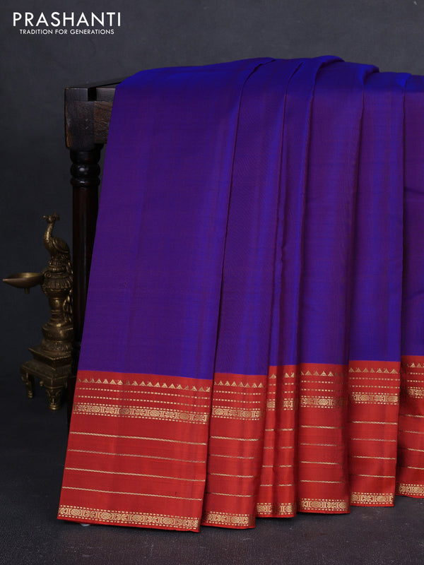 Pure kanchipuram silk saree violet and orange with plain body and zari woven border