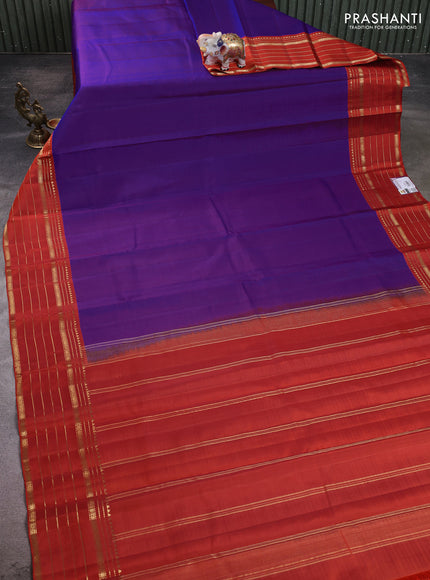 Pure kanchipuram silk saree violet and orange with plain body and zari woven border