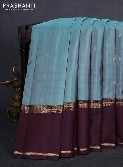 Pure kanchipuram silk saree pastel green and coffee brown with zari woven buttas and long rettapet zari woven border