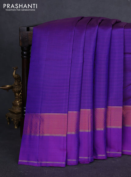 Pure kanchipuram silk saree blue and violet with allover stripe pattern and rettapet zari woven border