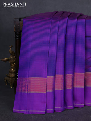 Pure kanchipuram silk saree blue and violet with allover stripe pattern and rettapet zari woven border