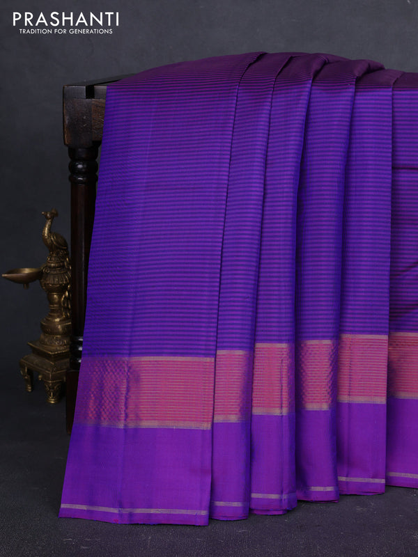 Pure kanchipuram silk saree blue and violet with allover stripe pattern and rettapet zari woven border